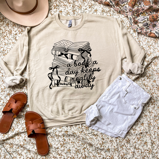 A book a day keeps reality away Sweatshirt